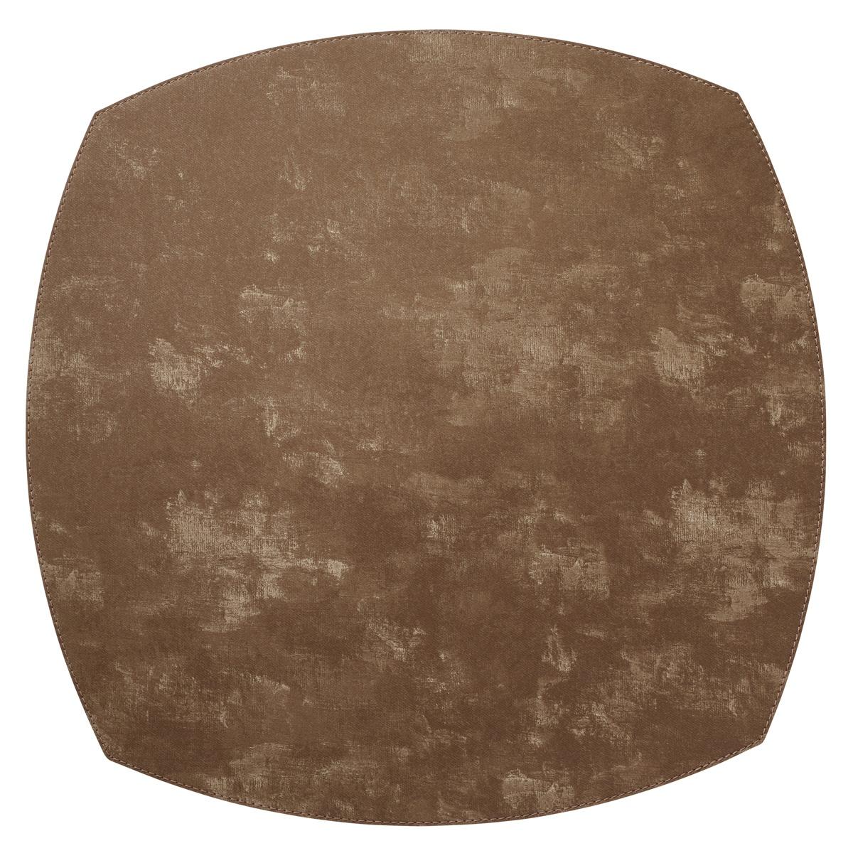 The Bodrum Velvet Elliptic Square Placemat Set of 4 features an easy-care vinyl design with a distressed textured finish and stitched border—perfect for adding luxe style to your dining table.