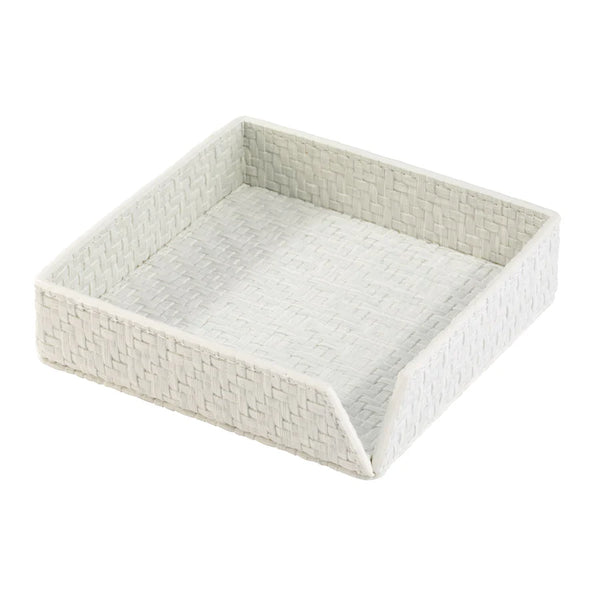 The Bodrum Wicker Cocktail Napkin Holder features a white woven design with a low front and raised sides, keeping napkins neat and tidy—perfect for adding an elegant touch to your table.