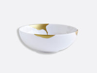 The Bernardaud Kintsugi Dinnerware bowl, crafted from white Limoges porcelain with gold-repaired cracks in the Japanese kintsugi style, is displayed against a plain light gray background.