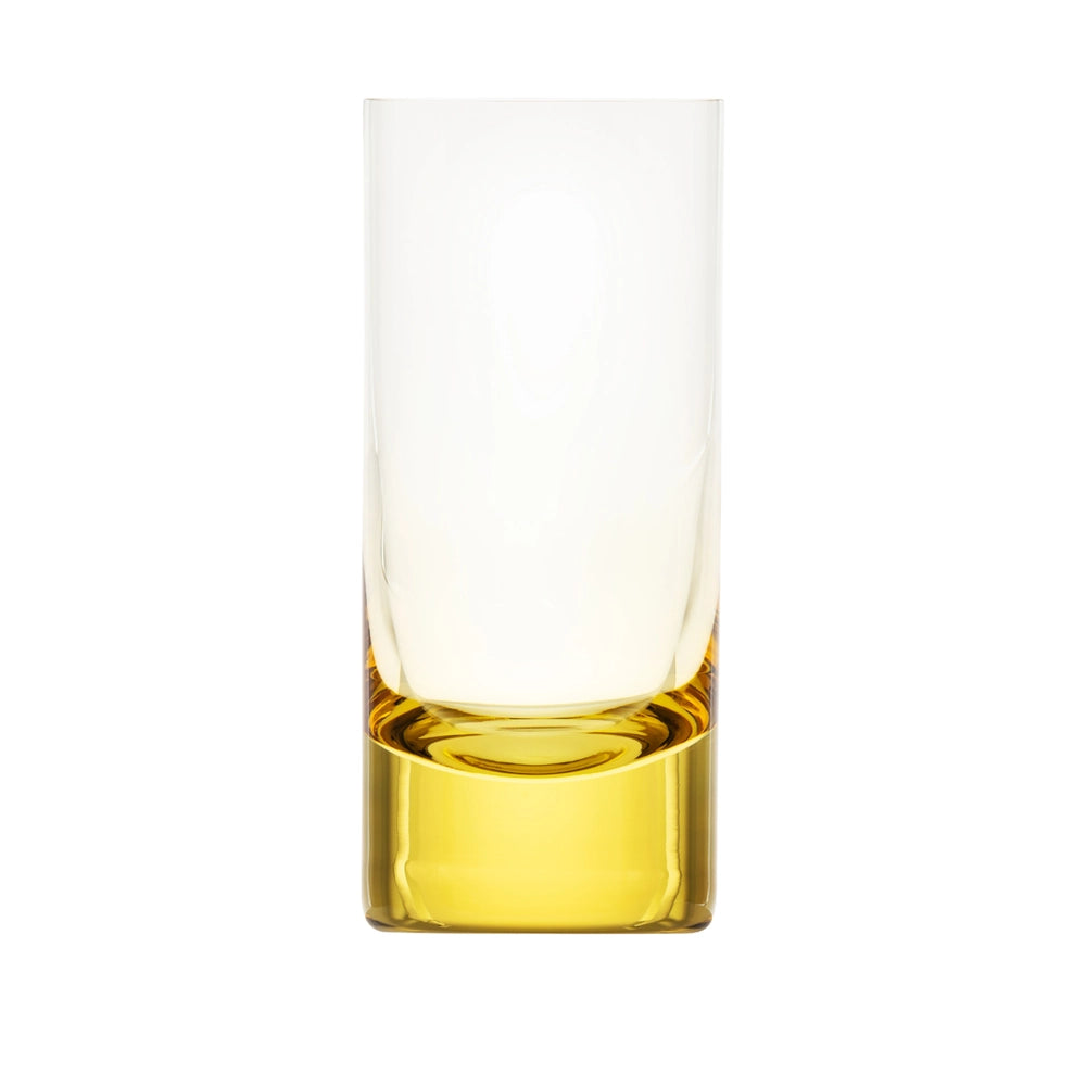 The Moser Whiskey Set Highball 400 ml is a clear, tall glass with a thick yellow base, crafted from lead-free crystal. Shown empty on a white background, it features a modern, minimalist design.