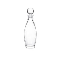 The Addison Decanter by Simon Pearce features a smooth, curved glass body and a round stopper. Displayed upright on a white background, this empty decorative decanter is an elegant addition to any barware collection.