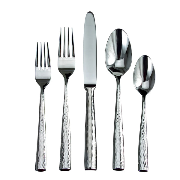The Ricci Anvil Flatware 5 Piece Setting includes two forks, a knife, a large spoon, and a small spoon with hammered texture, all made of 18/10 stainless steel and displayed on a white background.