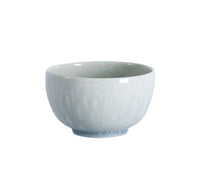 Small, round Tourron Dinnerware - Opale stoneware bowl with a pale, crackled glaze.