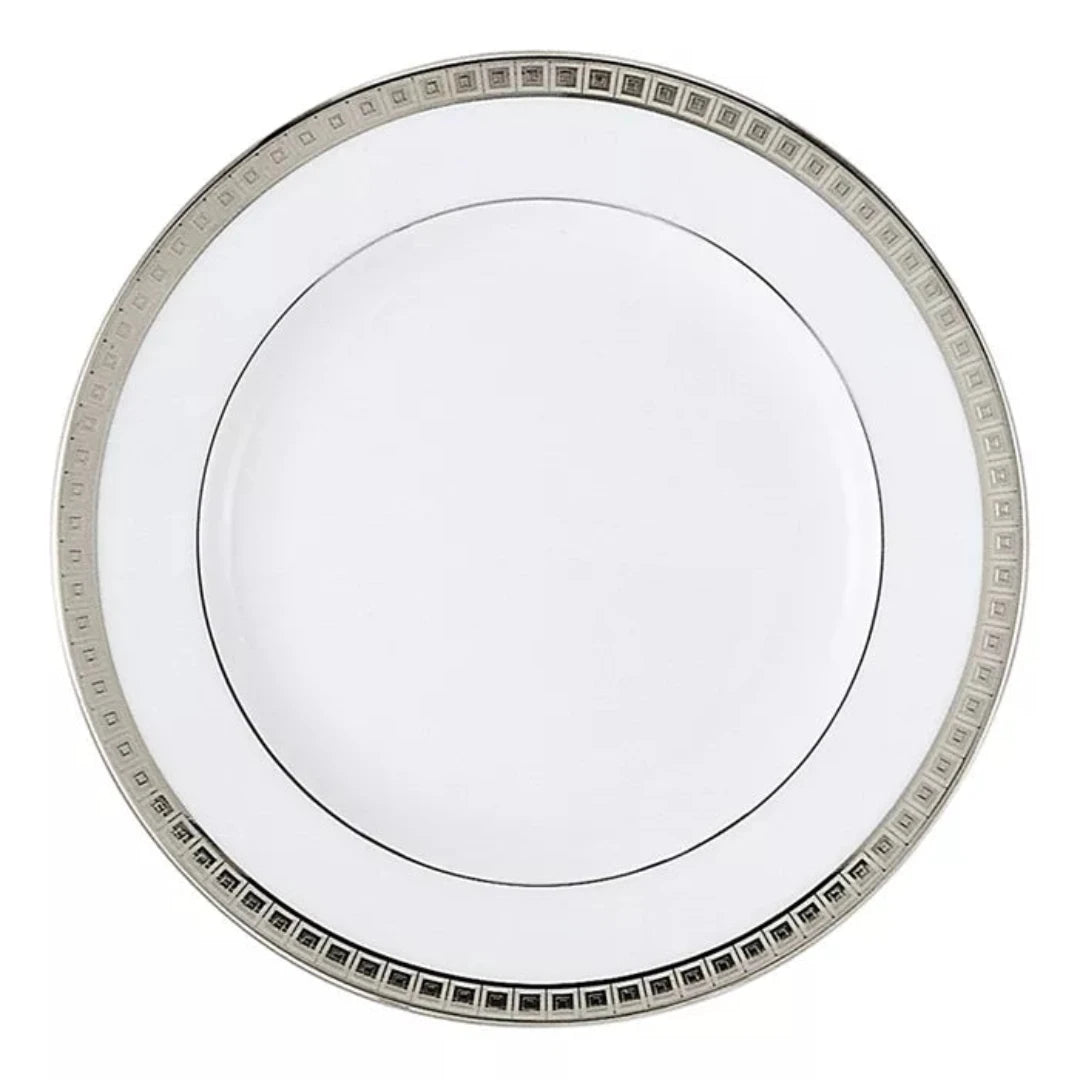 The Bernardaud Athena Platinum Dinnerware dinner plate, viewed from above on a white background, features a metallic silver geometric patterned rim and a thin black line near the border. The white porcelain plate is empty.