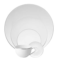 The Rosenthal TAC 02 Platinum Filet Dinnerware features white porcelain pieces with slim platinum rims, including three plate sizes, a saucer, and a teacup, all elegantly stacked for a modern presentation.