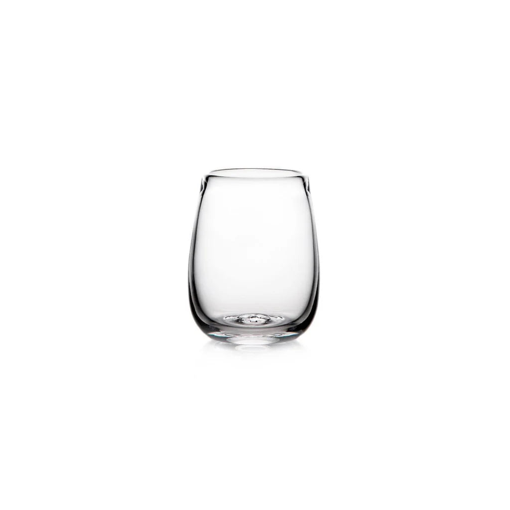 A clear, empty Woodstock Tumbler by Simon Pearce is centered on a white background.