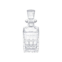 The Manhattan Square Decanter by Saint-Louis/Hermes features an elegant faceted crystal design with a matching stopper, ideal for spirits, and is displayed against a white background.