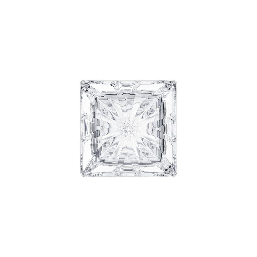 The Manhattan Square Decanter by Saint-Louis/Hermes features square-cut glass with intricate geometric patterns and a central starburst, its clear, reflective surfaces evoking sophisticated elegance against a white background.