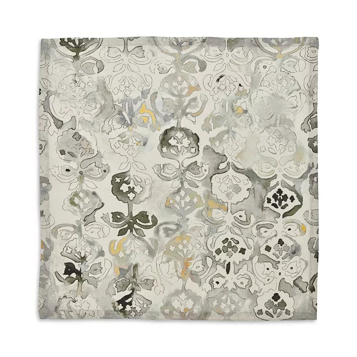 The Giverny Napkin Set of 4 by Kim Seybert features natural and grey abstract floral damask patterns, offering an elegant, Monet-inspired touch to your dinner napkin collection.