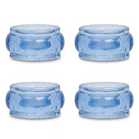 Four round blue glass Provence Napkin Ring Set/4 with a bubbled texture, perfect for colorful table decor.