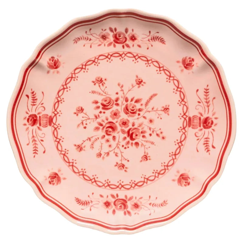 Vila Pink / Red dessert plate, a scalloped pale pink Portuguese ceramic dish featuring red rose motifs and decorative border patterns.