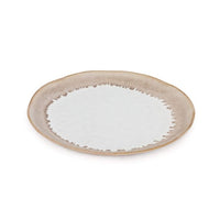 The Simon Pearce Burlington Dinnerware Bluff features a ceramic plate with a white center and textured, brownish-beige rim for an organic, pottery-inspired look.