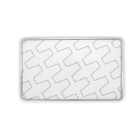 The Trasso Dinnerware by Vista Alegre is a rectangular white tray with interlocking gray zigzag patterns, a raised edge, and minimalist design that complements the geometric platinum dinnerware collection.