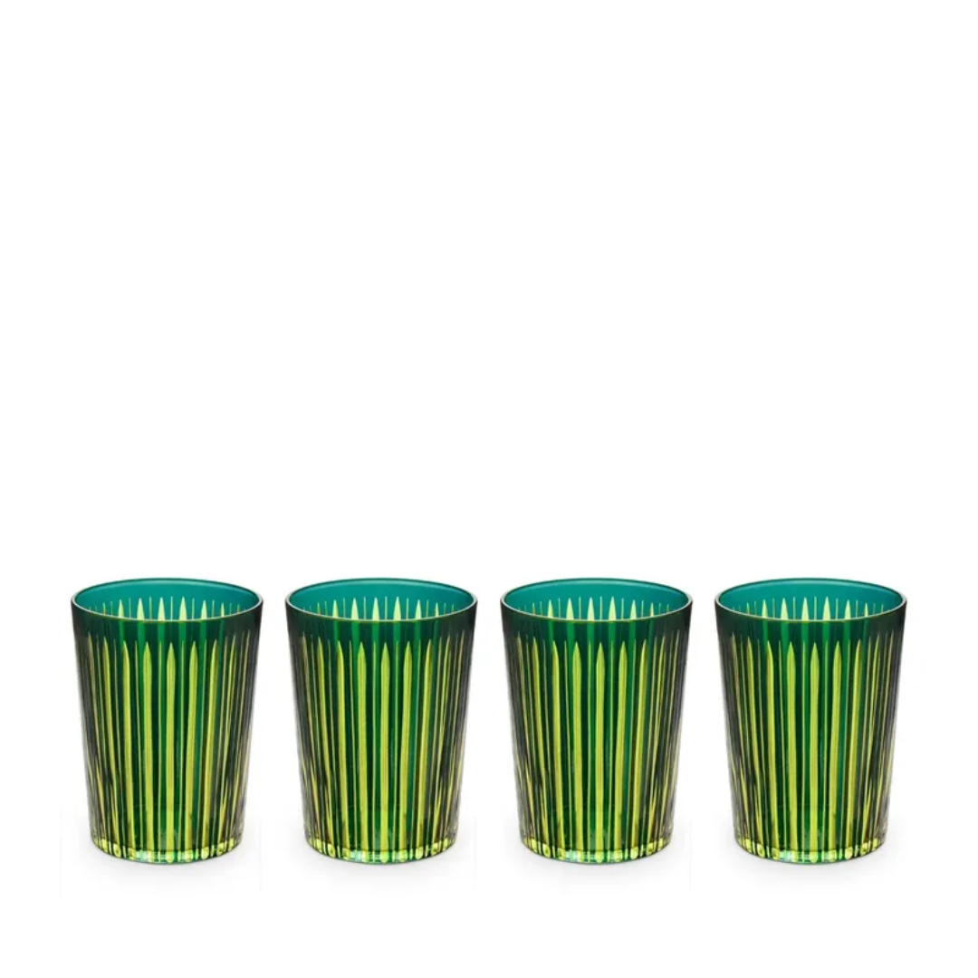 The L'Objet Prism Highball Set of 4 features stylish, dishwasher-safe glasses with a subtle green tint and vertical ribbed pattern, arranged in a row against a white background—perfect for adding elegance to any table setting.