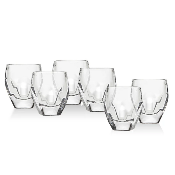 Six clear, faceted glass tumblers from the Godinger Stockholm Shot Glasses Set of 6 are arranged in two rows—three glasses in front and three behind—on a white background.