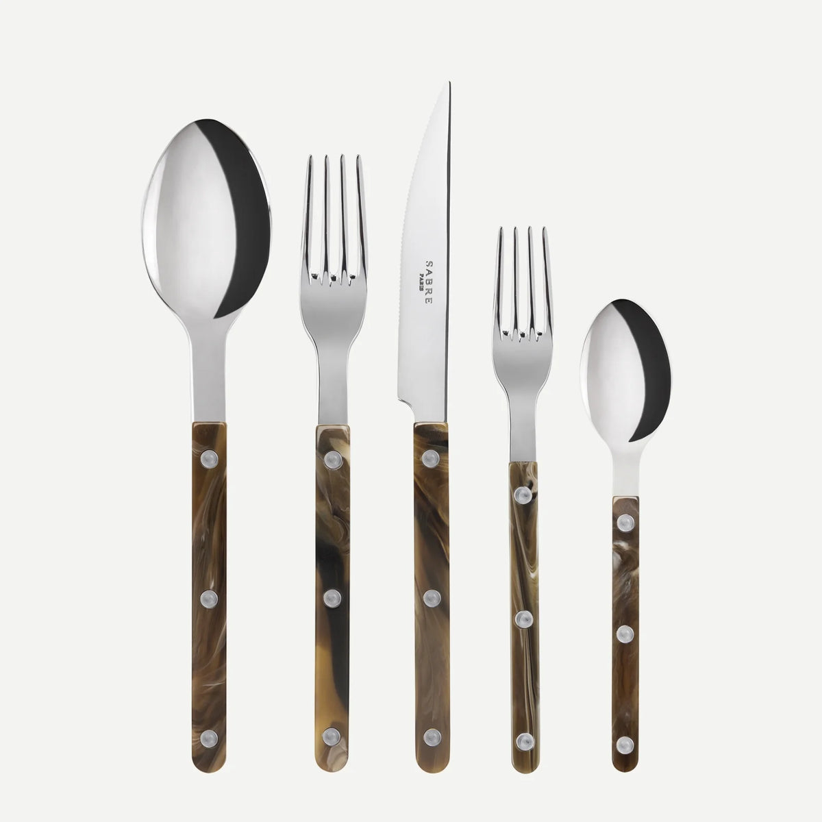 The Sabre Bistrot Flatware 5 Piece Set - Buffalo includes a knife, dinner fork, salad fork, soup spoon, and teaspoon—all featuring shiny metal heads and brown marbled handles with silver rivets.