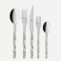 The Sabre Bistro Dune Flatware 5 Piece Setting features 18/10 stainless steel cutlery with polished heads and white-gray marbled handles, including a tablespoon, dinner fork, steak knife, salad fork, and teaspoon in classic bistro style.