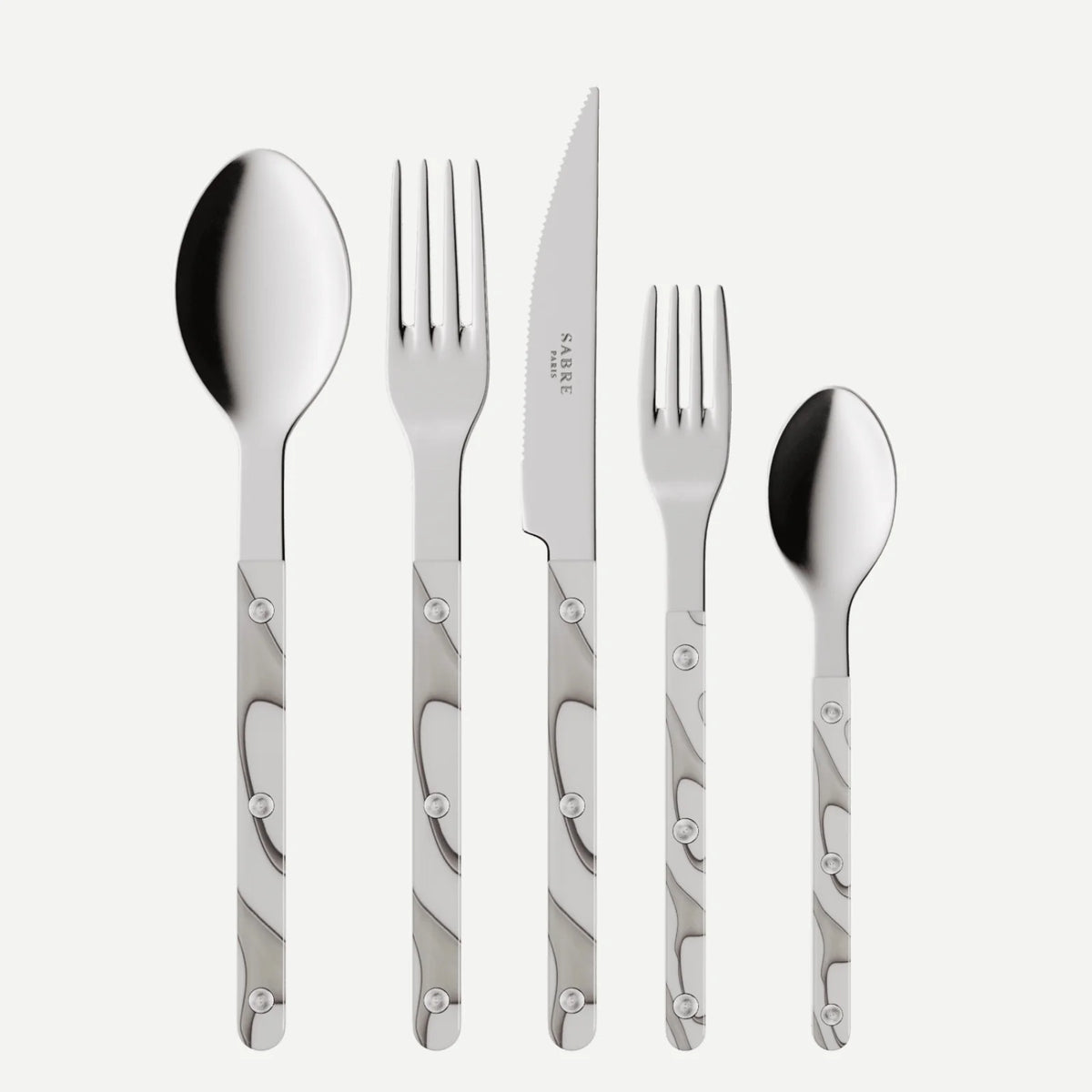 The Sabre Bistro Dune Flatware 5 Piece Setting features 18/10 stainless steel heads and patterned metal handles, including a large spoon, dinner fork, serrated knife, small fork, and small spoon displayed side by side on a white background.