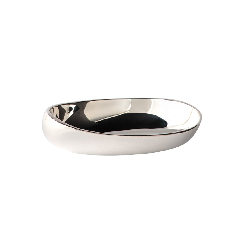 The Greg Natale Pietra Catchall is a shiny, oval dish featuring an organic design with smooth, curved edges, displayed against a plain white background.