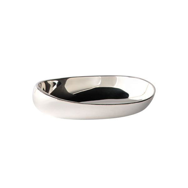 The Greg Natale Pietra Catchall is a shiny, oval dish featuring an organic design with smooth, curved edges, displayed against a plain white background.