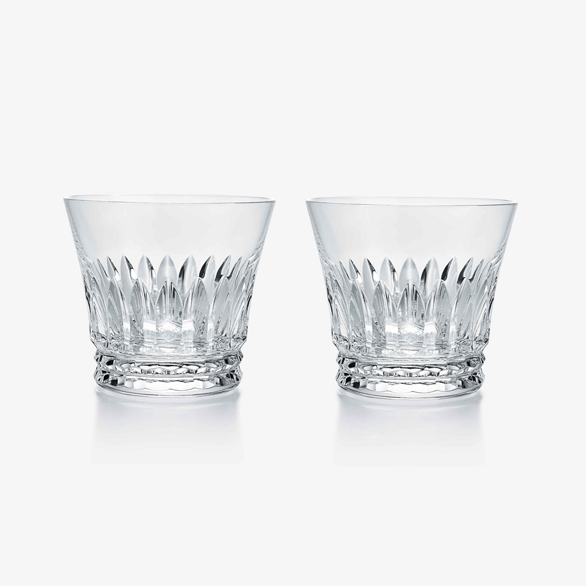 A pair of Everyday Tiara Tumblers by Baccarat, crafted from premium crystal glass with intricate cut patterns, are displayed side by side on a white background—an elegant gift for cocktail enthusiasts.