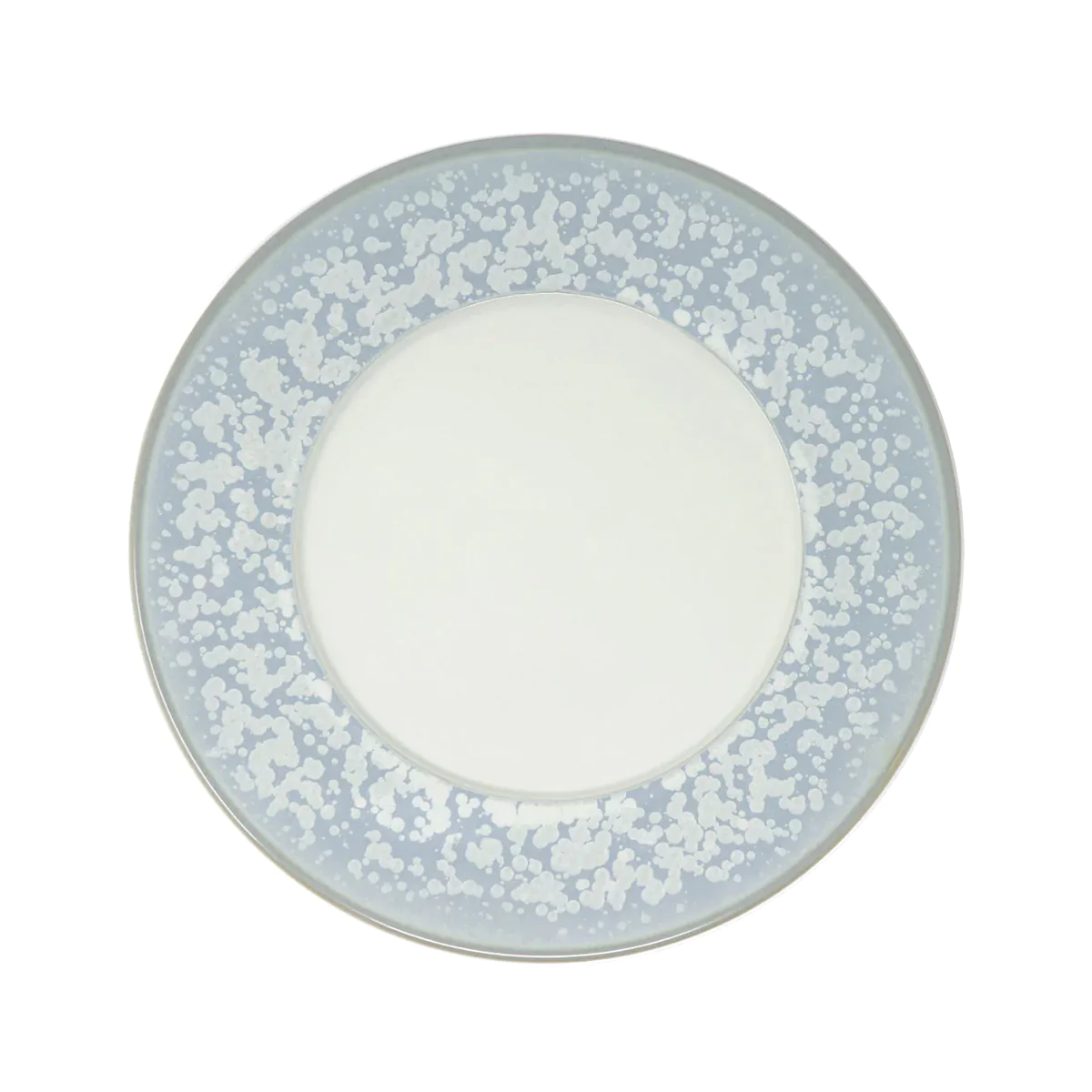 The Song Ocean Dinnerware plate by Jaune De Chrome features a round ceramic design with a white center and wide light blue border speckled with white dots, inspired by French dinnerware and shown from above on a white background.