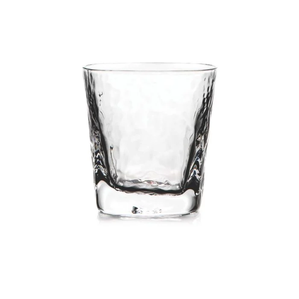 The Simon Pearce Woodbury DOF is a clear, empty Double Old-Fashioned tumbler with a subtly textured, wavy surface inspired by Georgian glassmaking, shown against a plain white background.