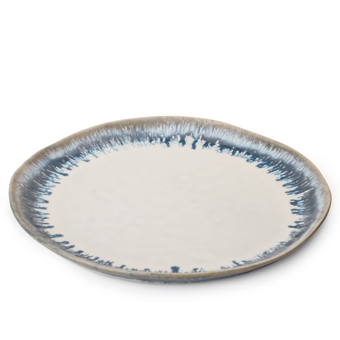 The Simon Pearce Burlington Dinnerware Pool is a round ceramic plate with a glazed, slightly uneven edge, a white center, and a blue-gray speckled rim, shown against a plain white background.