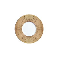 The Infini Prestige Gold Dinnerware by Haviland is a round Limoges porcelain plate with a wide, textured gold and brown rim featuring radiating lines and a smooth white center, shown against a white background.