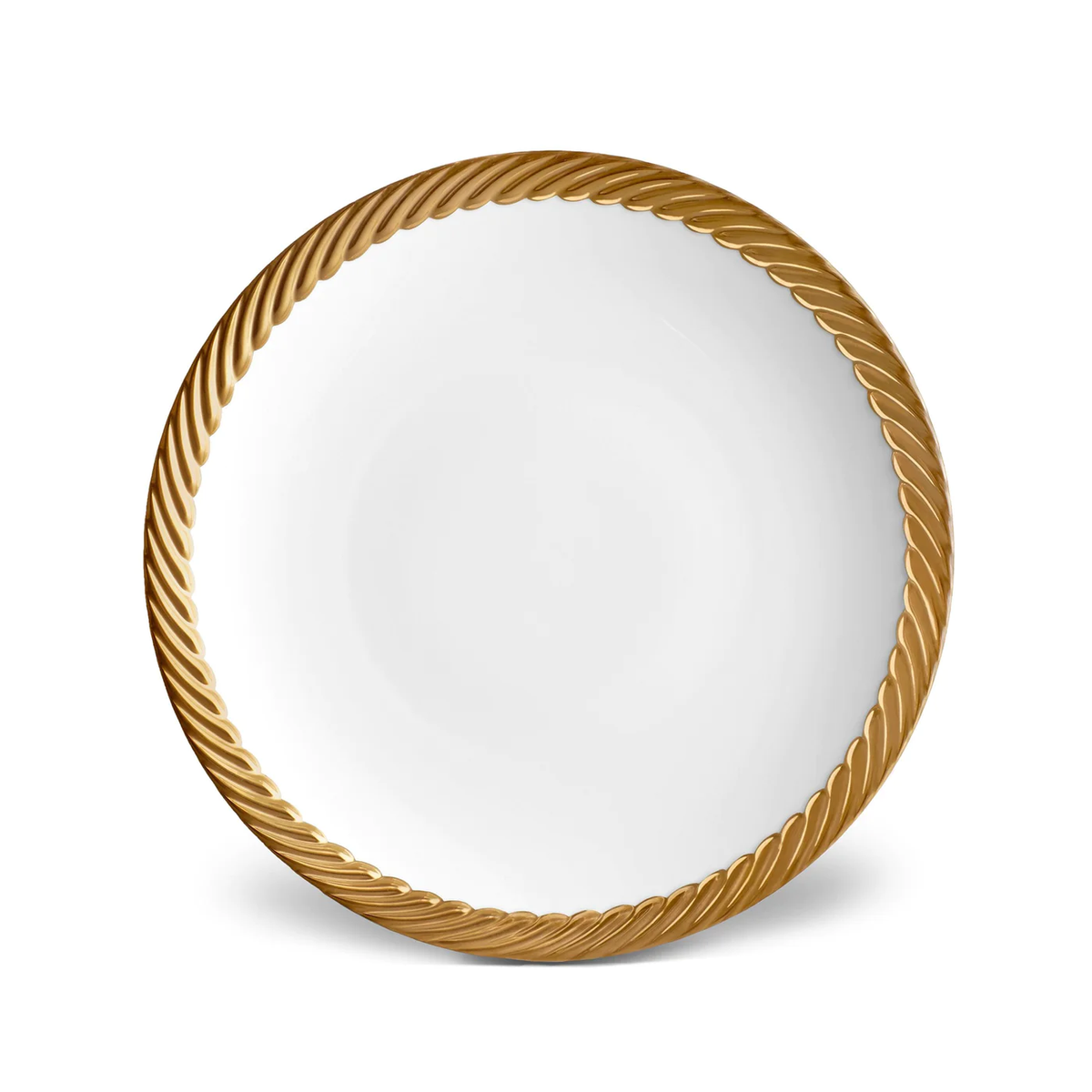 The L'Objet Corde Dinnerware Gold is a white plate with a textured, twisted rope-like gold rim, seen from above on a plain background—an elegant addition to any modern table setting.