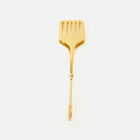 The Blue Pheasant Zena Serving Tongs, featuring a gold-plated finish, slotted head, and scissor-like handle, are displayed on a white background.