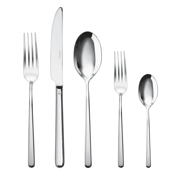 The Sambonet Linear Solid Handle Flatware 5 Place Setting includes a dinner fork, knife, soup spoon, salad fork, and teaspoon in stainless steel with sleek, polished handles and a modern design arranged side by side.