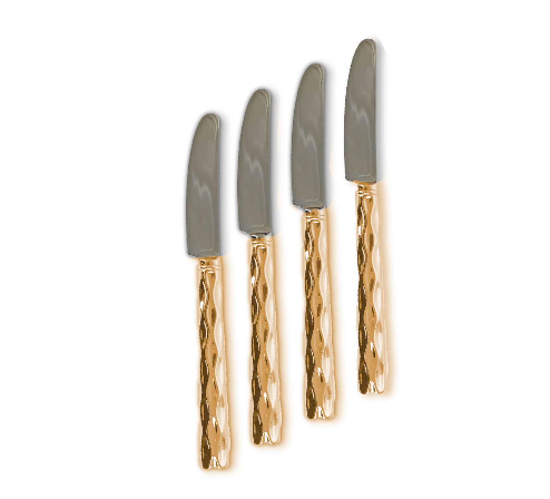 The Michael Wainwright Truro Gold Spreaders Set of 4 features stainless steel blades and shiny, textured 24k gold handles—elegantly arranged against a white background, making them an ideal hostess gift.