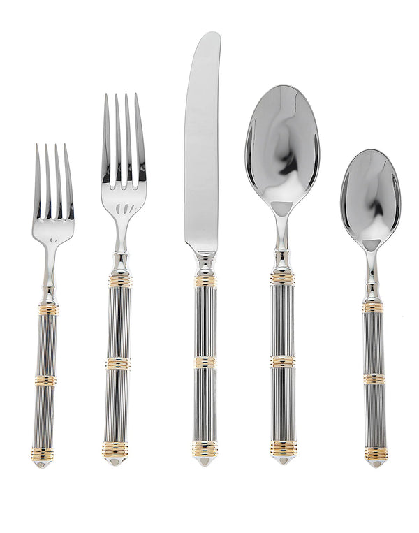 The Ricci Castello Flatware Gold 5-Piece Setting features 24kt gold-accented handles and includes a dinner fork, salad fork, knife, soup spoon, and teaspoon—all arranged in a straight line on a white background.