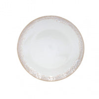 The Casafina Taormina Dinnerware White plate is a round, white fine stoneware piece with a textured light beige rim, made in Portugal and shown from above on a plain white background.