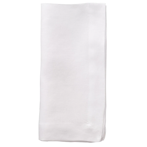 A neatly folded Riviera Napkin from Bodrum, part of a set of 4 plain white soft linen napkins, displayed against a white background.
