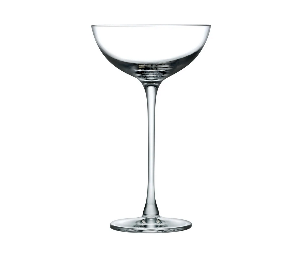 The Hepburn Coupe Glass Set of 2 by Nude Glassware features wide, shallow bowls, long slender stems, and circular bases, expertly crafted from lead-free crystal and shown against a plain white background.