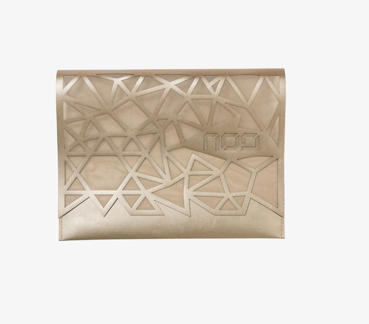 The Geometric Afikoman Bag by Apeloig Collection features a beige design with triangular cutouts, subtle embossed logo, and modern Passover-inspired style, showcased on a plain white background.