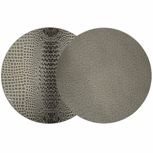Two overlapping gray circles: the left has a reptile-scale texture, while the right resembles beaded placemat edges. Both evoke the Double Sided Round Keys Gator Placemat Set of 4 by Julian Mejia.