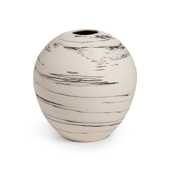 Beachstone Vase Sand by Simon Pearce: A round, off-white ceramic vase with a small opening at the top and abstract brown and gray marbled streaks accenting its hand-thrown surface. This artisan piece is a stunning addition to any pottery collection. Displayed on a plain white background.