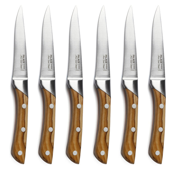 Six matching Alain Saint-Joanis Palace Steak Knives with polished wooden handles and silver blades are arranged vertically in a row on a white background.