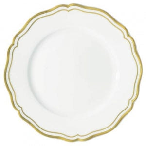 The Raynaud Polka Gold Dinnerware showcases a white ceramic plate with a scallop edge and two thin gold bands along the rim, bringing refined elegance to your table setting.