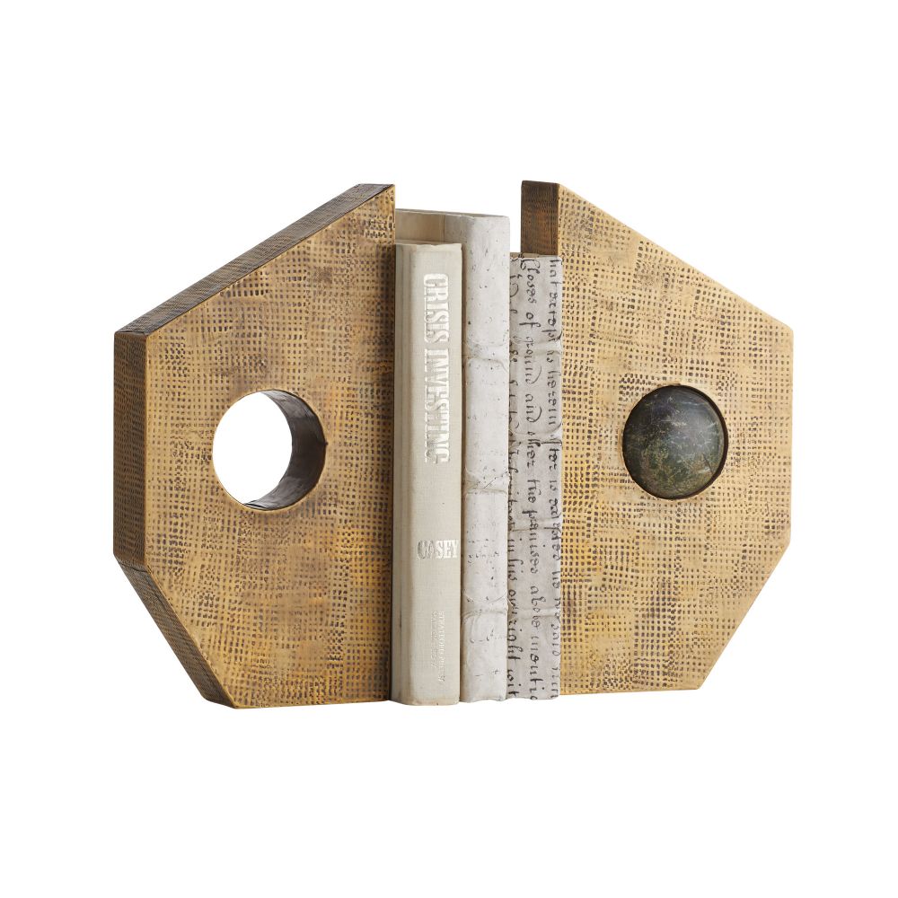 The Garrick Bookends Set of 2 by Arteriors features geometric, textured wooden bookends with unique circular cutouts and a striking pattern, each showcasing different circular insets accented with subtle marble details—perfect for holding your books upright in style.