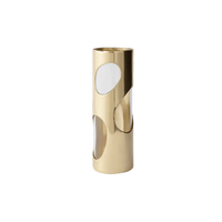 A cylindrical Pietra Plated Vase by Greg Natale showcases large oval cut-out openings on its sides, revealing the hollow interior in a striking biomorphic design, set against a plain white background.