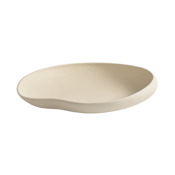 The Tefra Bowl by Greg Natale is a shallow, cream-toned ceramic plate with an organic, irregular shape and matte finish—ideal for chic interior styling or pairing with sculptural serveware—shown on a plain white background.