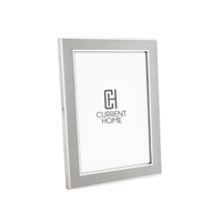The Addison Ross Enamel Thin Chiffon Silver Frame is a sleek, modern rectangular photo frame with a smooth metallic finish. It stands upright, features a white insert with the logo, and supports both portrait and landscape display.