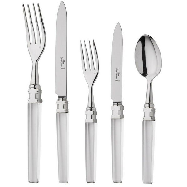 The Alain Saint-Joanis Ingrid Flatware 5 Piece Setting—featuring a dinner fork, knife, salad fork, steak knife, and soup spoon with polished silver handles—is elegantly displayed on a white background.