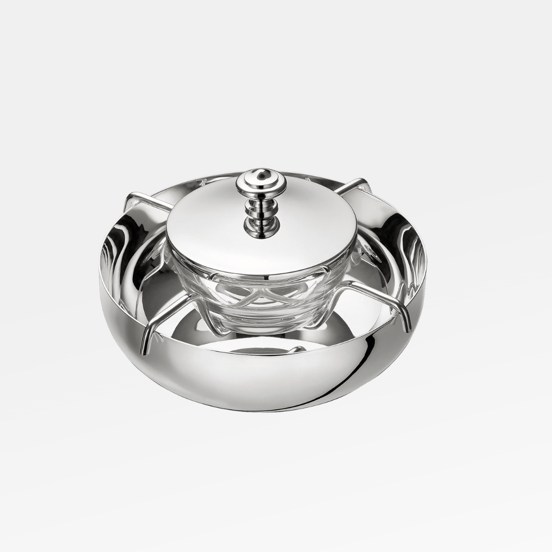 The Christofle Albi Silver Plated Caviar Set, featuring a lidded design with a round handle and an inner glass container, is displayed centered on a plain white background.