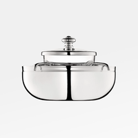 The Christofle Albi Silver Plated Caviar Set features a rounded, symmetrical design with a matching lid and the elegant Albi pattern, photographed on a plain white background for a modern touch.