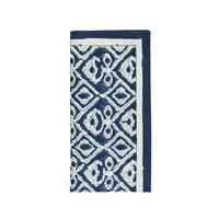 The Kim Seybert Alfresco Napkin Navy & Blue Set of 4 features folded cotton napkins with a blue and white geometric diamond pattern and a solid blue border, inspired by traditional Indian block printing—ideal for alfresco dining.
